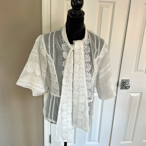 Stunning organza blouse with pearl buttons and bow tie neck. - Picture 1 of 8